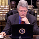 Clinton “surfs the internet” looking for Christmas gifts on December 20, 1999 (Tim Sloan/AFP/Getty Images)